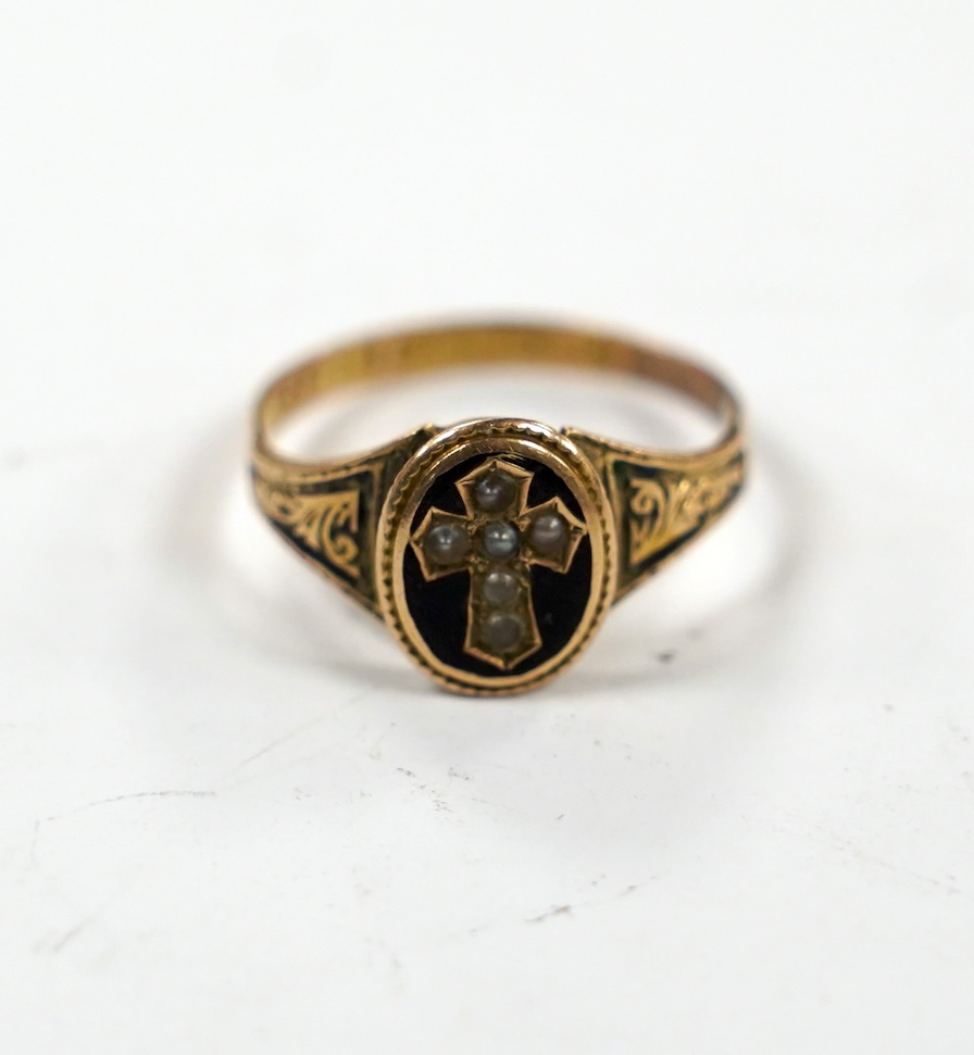 A Victorian 15ct gold black enamel and seed pearl set mourning ring, size Q, gross weight 2.3 grams.